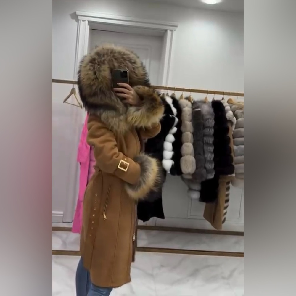 Brown coat with natural raccoon fur